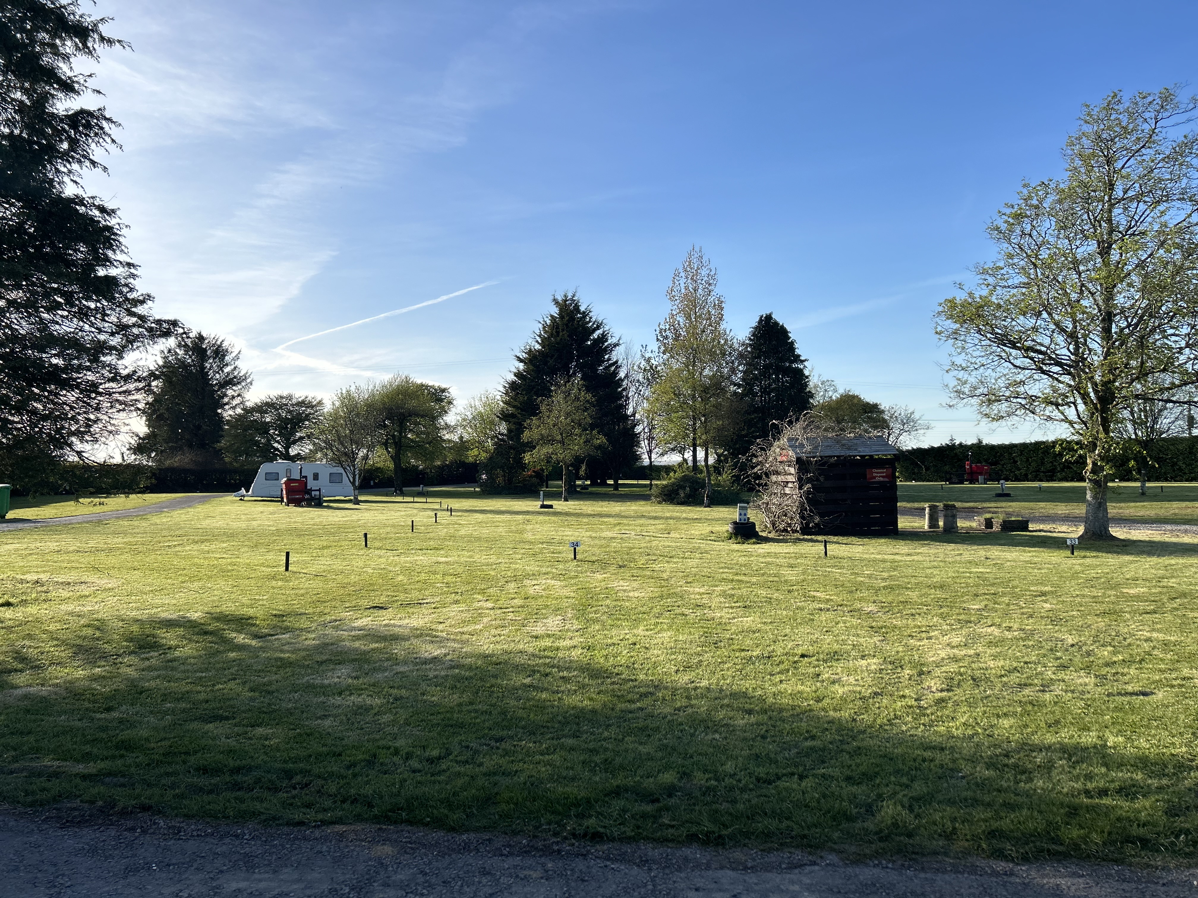 Open green pitches at Zeacombe House Caravan Park